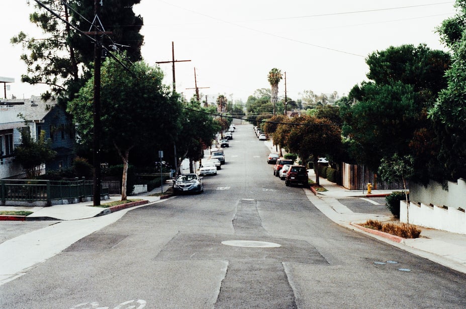 Cars Parked Beside Concrete Road